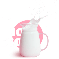Milk in a jug with splashes as a background of bio eco